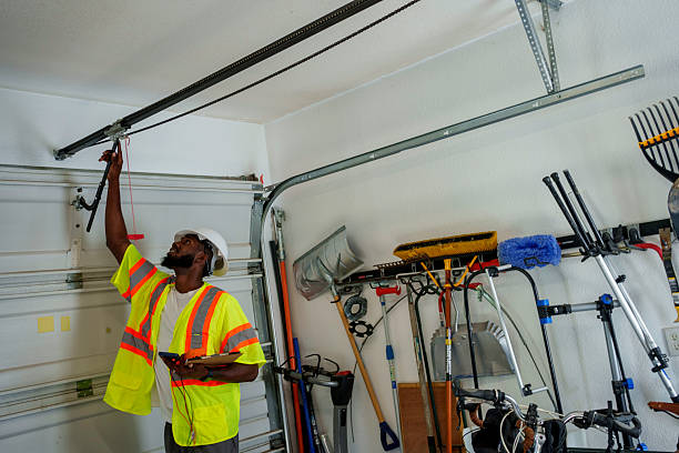 Professional Garage Door Panel Replacement technician working in North Edwards, CA